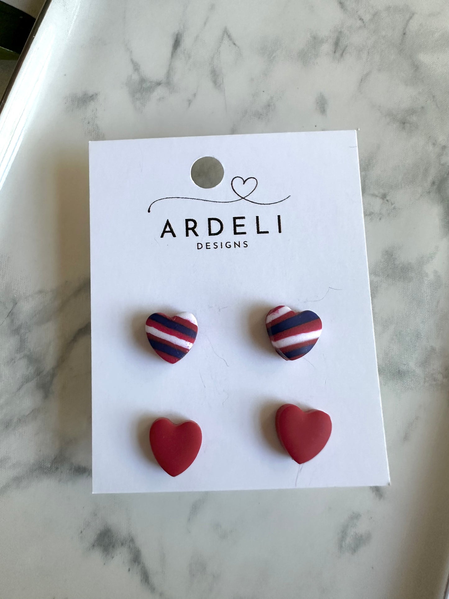 “Buffaluv” Zubaz Heart Red Stud Pack Earrings